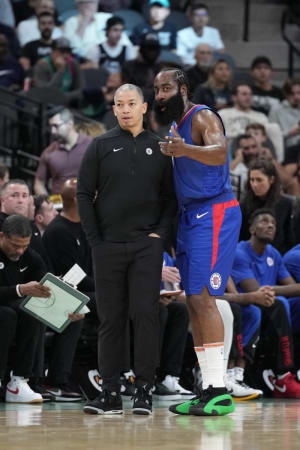 Nov 20, 2023; San Antonio, Texas, USA; LA Clippers head coach Tyronn Lue talks with guard James Harden (1) in the first half against the San Antonio Spurs at the Frost Bank Center.